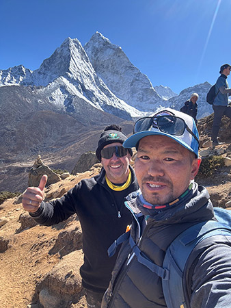 David Sullivan above Everest Base Camp with Sherpa