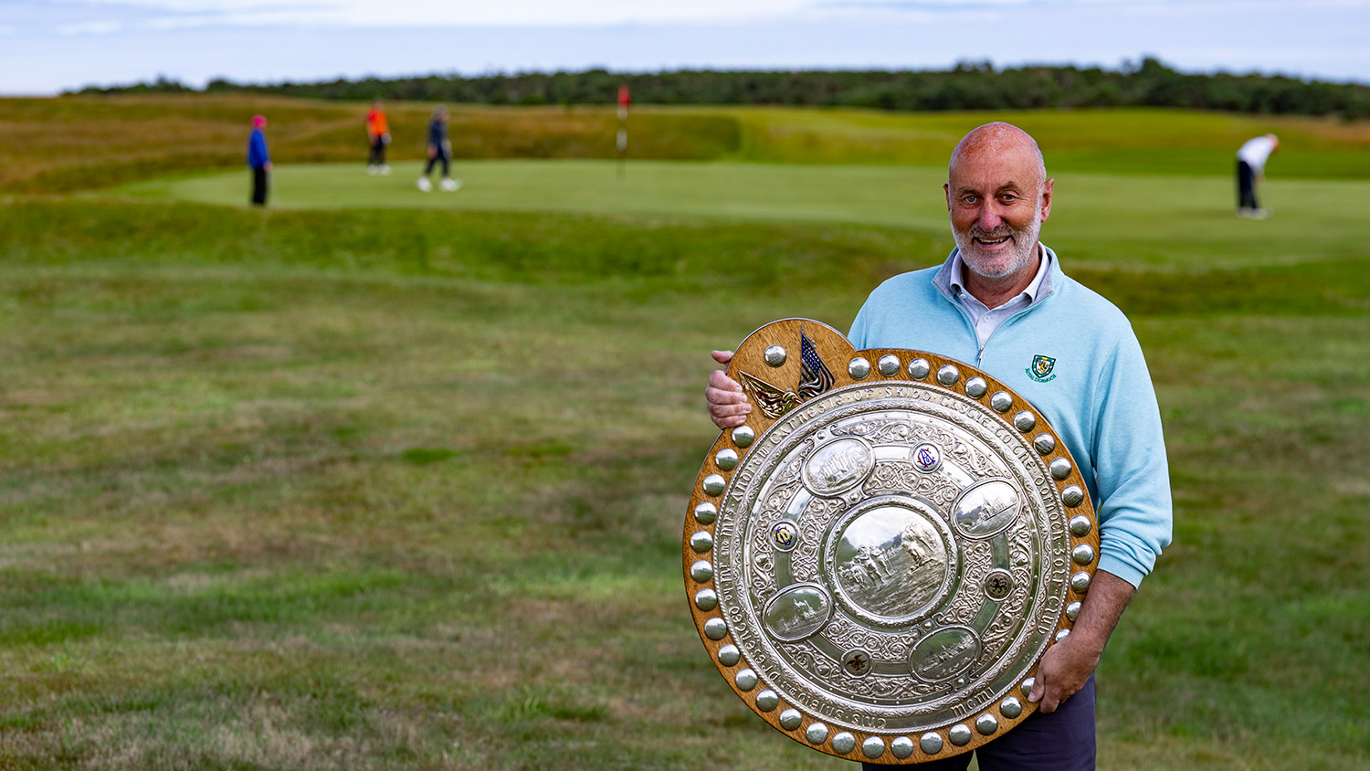 Royal Dornoch Captain Gary Bethune with the Carnegie Shield